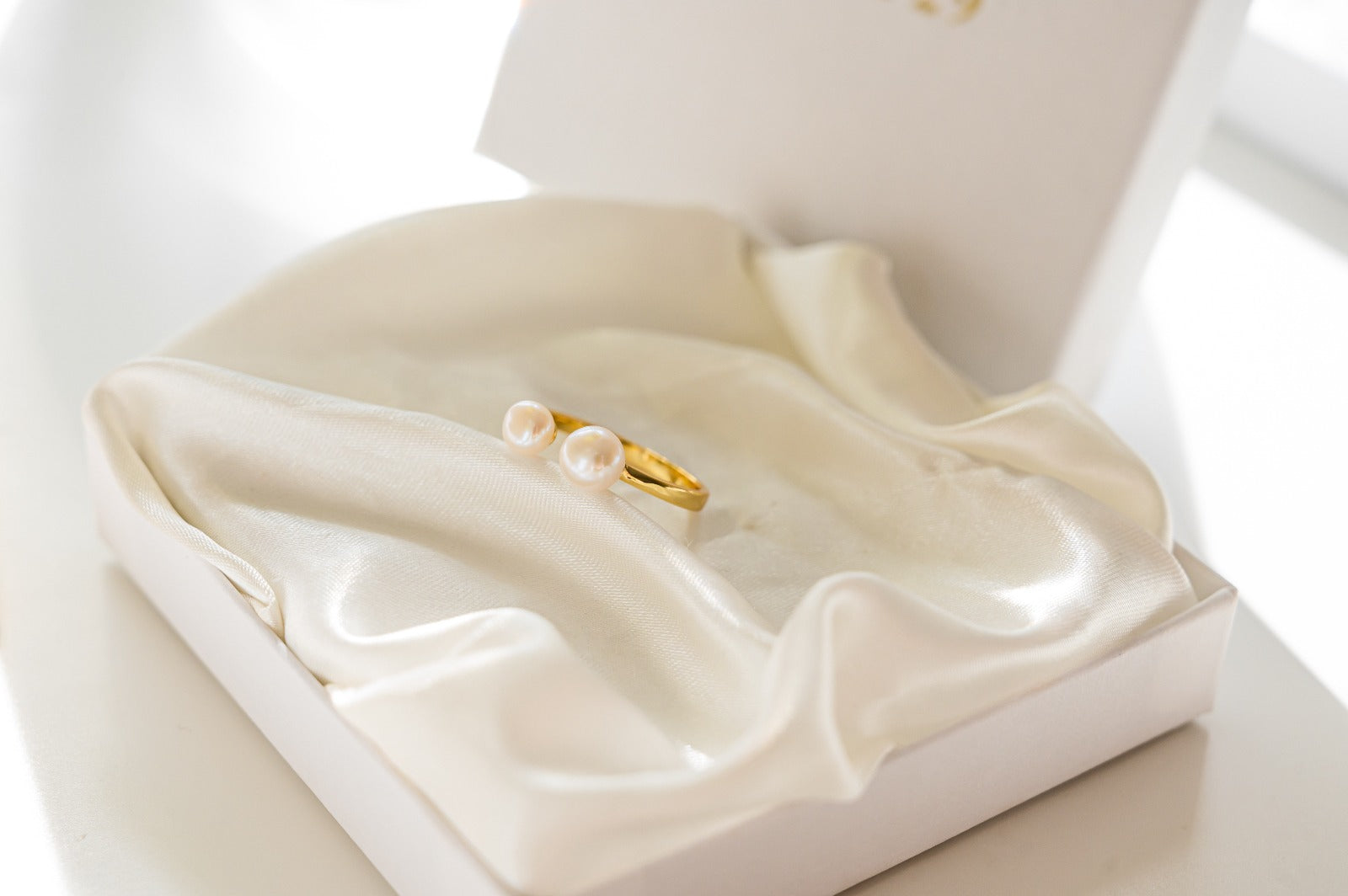 gold double pearl ring